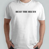 Damon Albarn wearing beat the blues shirts