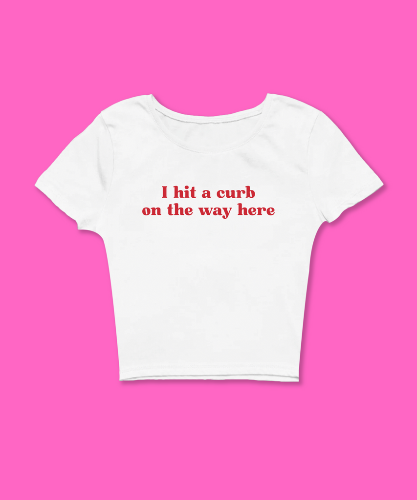 I Hit A Curb On The Way Here Funny White Baby Tee