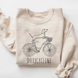 Doxycycline Pharmacy Pun T-shirt - Pharmacists Sweatshirt, Dachshund on Bicycle, Perfect Gift for Pharmacists & Technicians sweatshirts