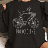 Doxycycline Pharmacy Pun T-shirt - Pharmacists Sweatshirt, Dachshund on Bicycle, Perfect Gift for Pharmacists & Technicians sweatshirts