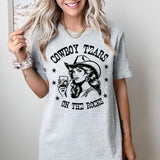 Cowboy Tears on the Rocks- T-Shirt -  Print is Sublimation, Unisex T-Shirt, Funny Tee,Gift Idea, Relaxed Fit, Casual Apparel, Great with Jeans, Womens
