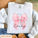 Custom Coquette Name Gift For Nurses, Healthcare Workers Sweatshirt, Pink Bow & Stethoscope Design, Nurse Bow Shirt, Christmas Nurse Gift, Unisex Shir