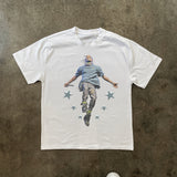 TRAVIS SCOTT ICONIC JUMP ACTION FIGURE TYLE HEAVYWEIGHT WHITE T-SHIRT