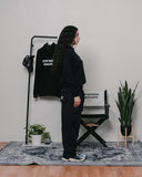 Stop Watering Dead Plants 2.0 Relaxed Black Hoodie